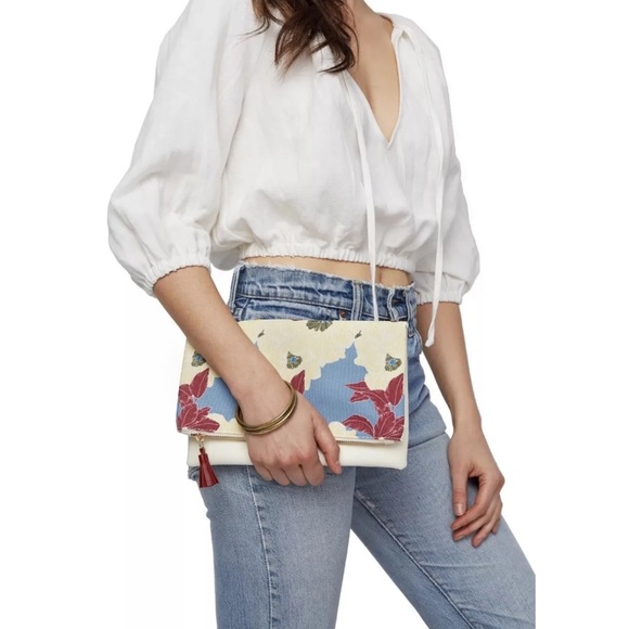 Rachel Pally Handbags - NWOT Rachel Pally leather trimmed reversible printed clutch